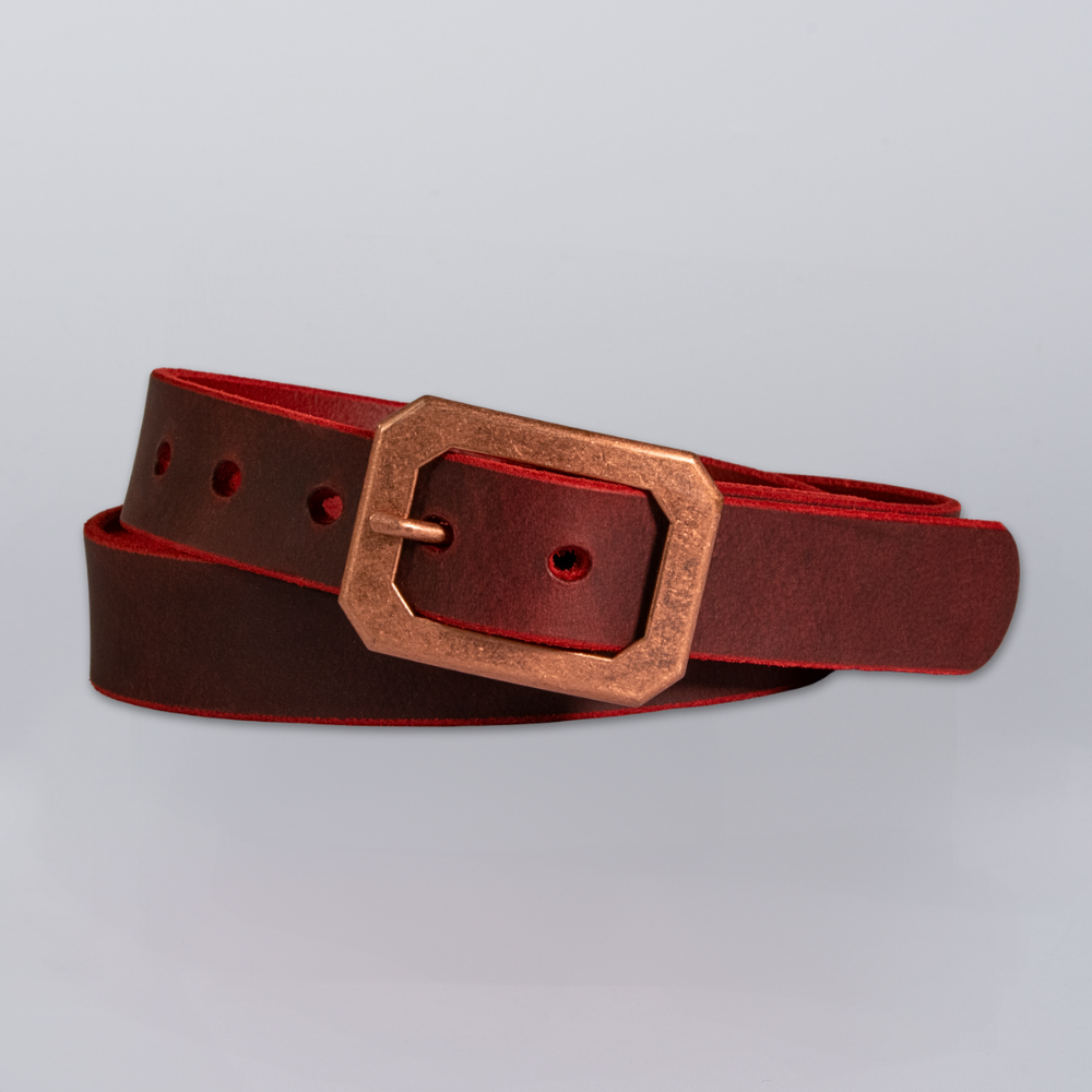 The Lainey by Hanks Belts, a dark brown full grain Crazy Horse leather belt with a rectangular gold buckle, is shown coiled neatly on a plain light gray background.