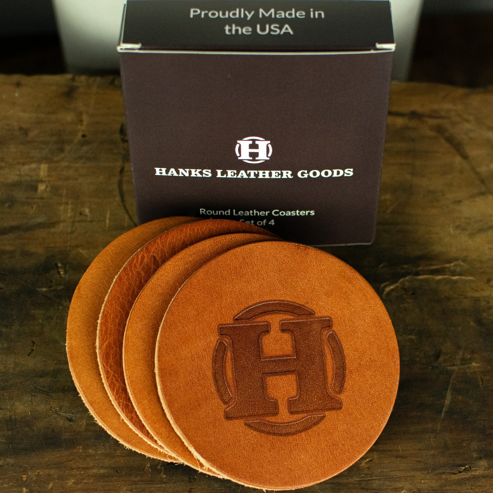 Set of 4 round leather coasters with box for packaging in retro tan