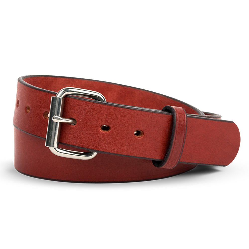 A rolled-up chestnut full-grain steer hide leather belt with a silver rectangular buckle and adjustment holes, placed on a white background—The Gunner by Hanks Belts, renowned for classic style and lasting durability.