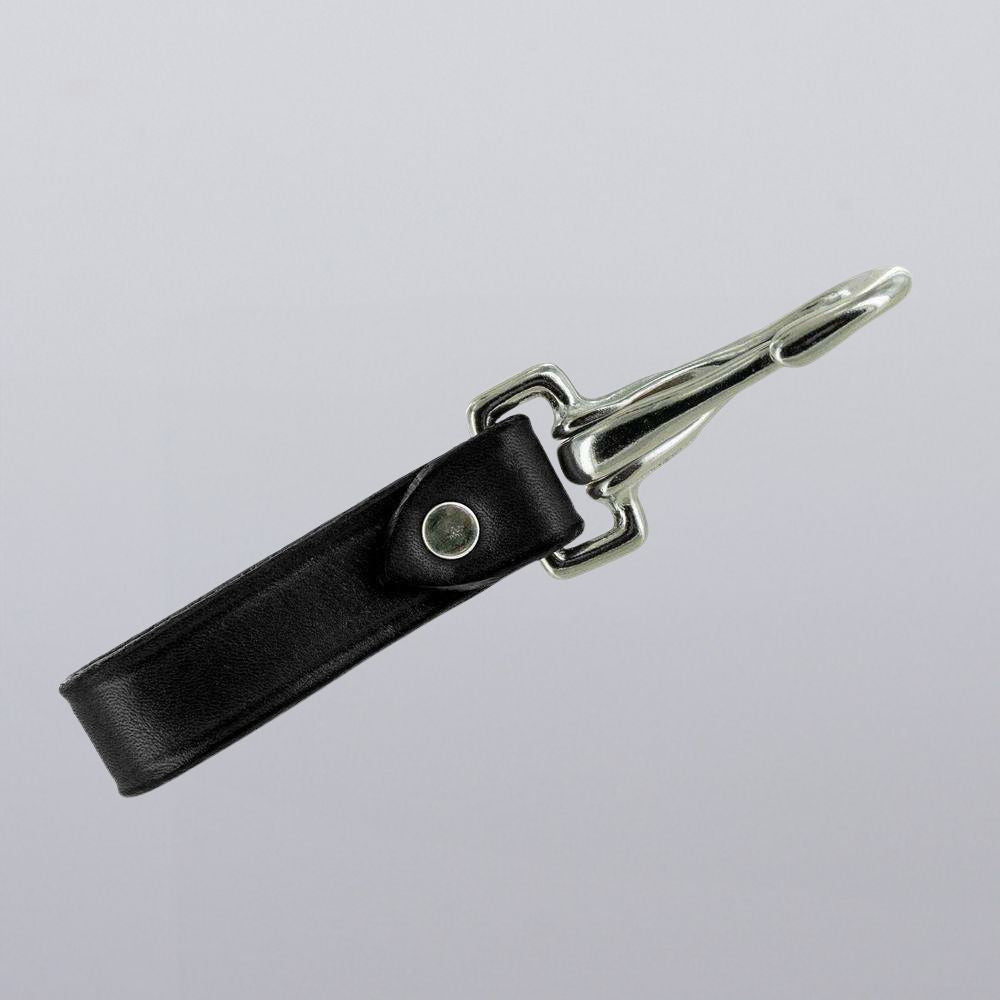 The Canyon Keychains by Hanks Belts feature a black leather loop and silver metal clasp, photographed on a light gray background—an elegant, durable choice for key fobs or everyday use on belts.