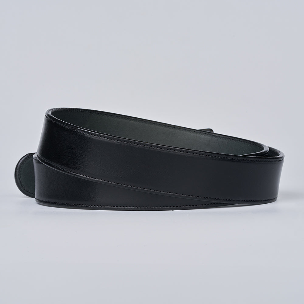 The Canyon by Hanks Belts is a coiled black English bridle leather belt with visible stitching, displayed against a plain light gray background. This handcrafted belt comes without a buckle attached.