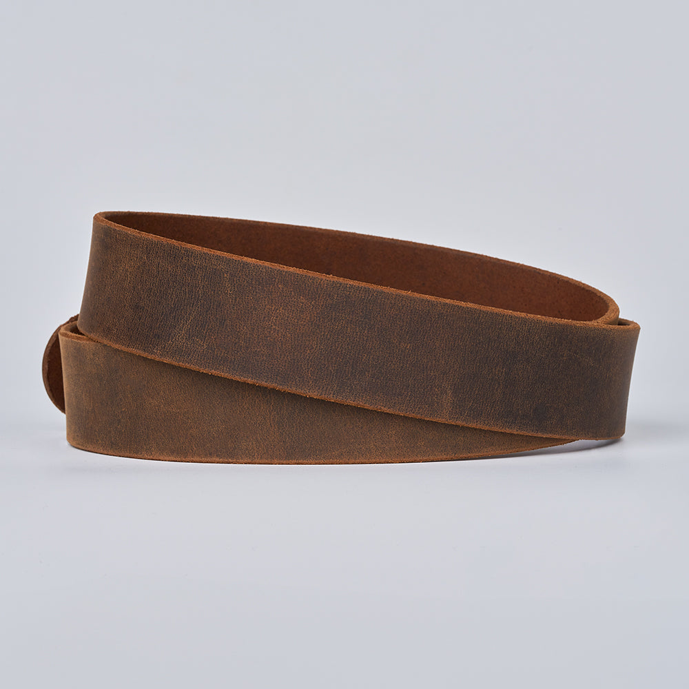 The Crazy Horse by Hanks Belts—a rolled retro Water Buffalo leather belt with a matte finish—displayed on a plain light gray background. The buckle is not visible.