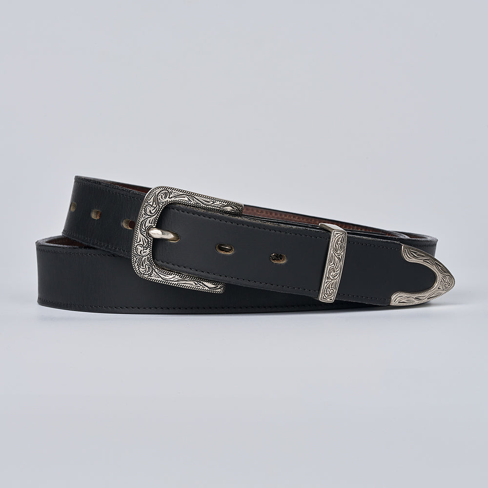 The Dakota Bison by Hanks Belts: a black bison leather western belt with an ornate floral engraved buckle, tip, and loop, shown on a plain light gray background.