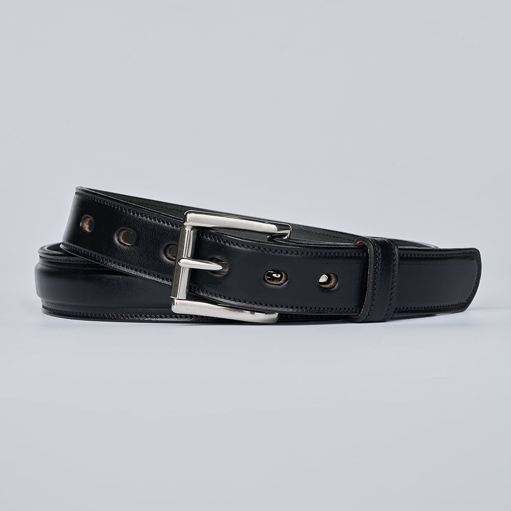 The Esquire Raised by Hanks Belts is a premium black leather belt with multiple large circular holes and a silver buckle, shown coiled neatly on a plain light gray background.
