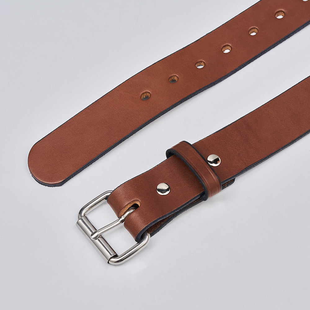 The Gunner by Hanks Belts, a brown leather work belt with a silver buckle and multiple adjustment holes, is displayed flat on a light gray background.
