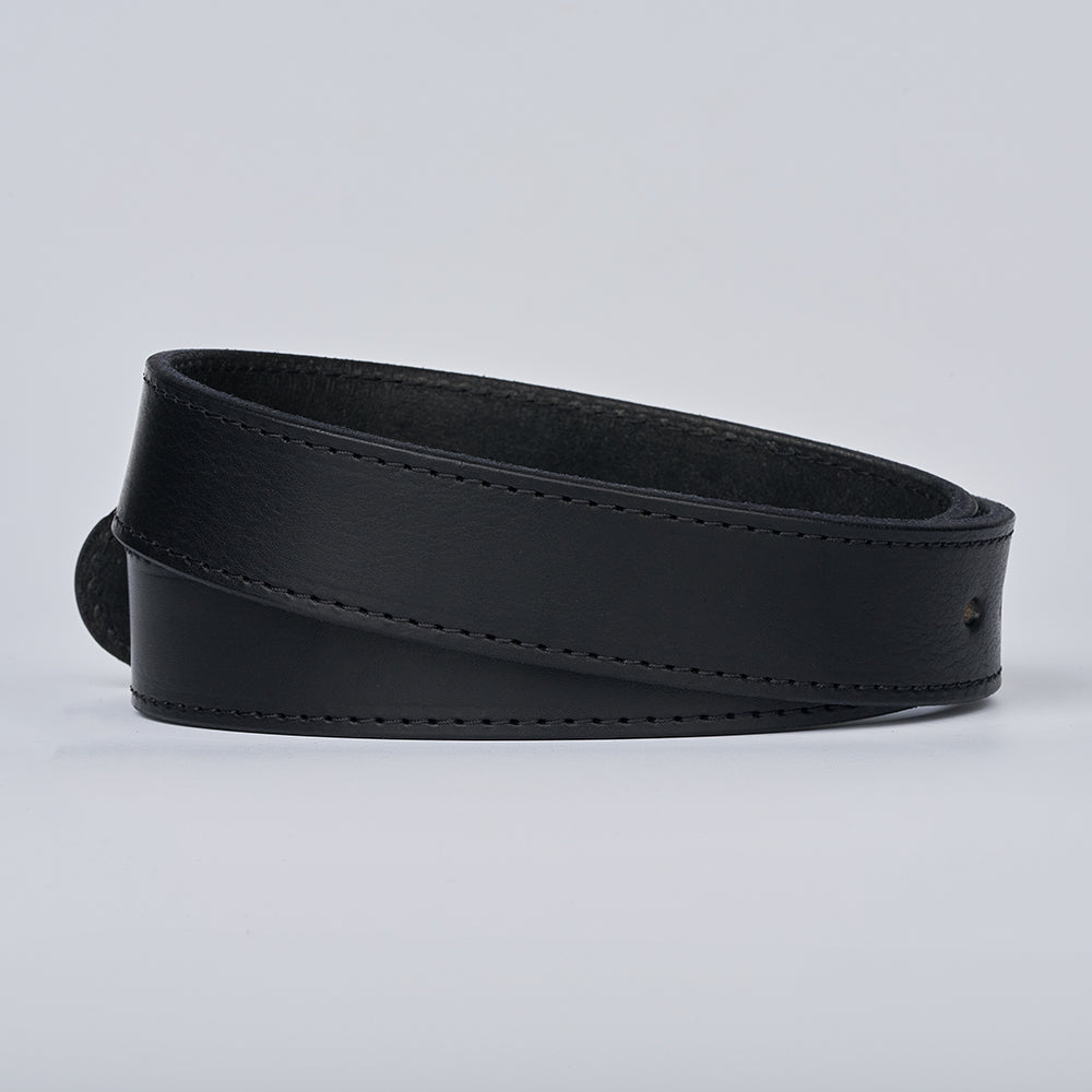 The Gunner Stitched by Hanks Belts is a coiled black full-grain leather belt with visible stitching, shown against a plain light gray background.