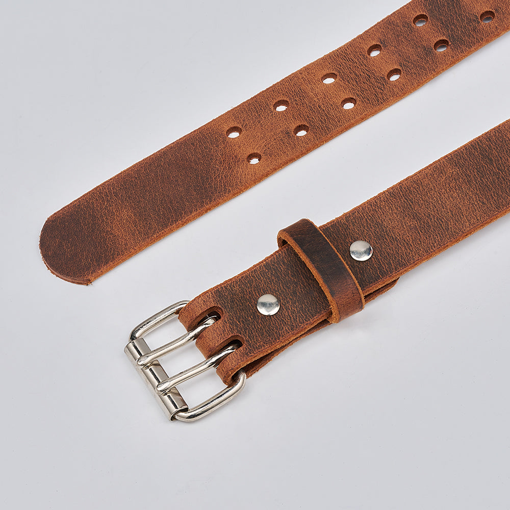 The Legend Double Prong Retro Style by Hanks Belts is a full grain leather belt with a double-prong silver roller buckle and multiple holes, shown on a light gray background.