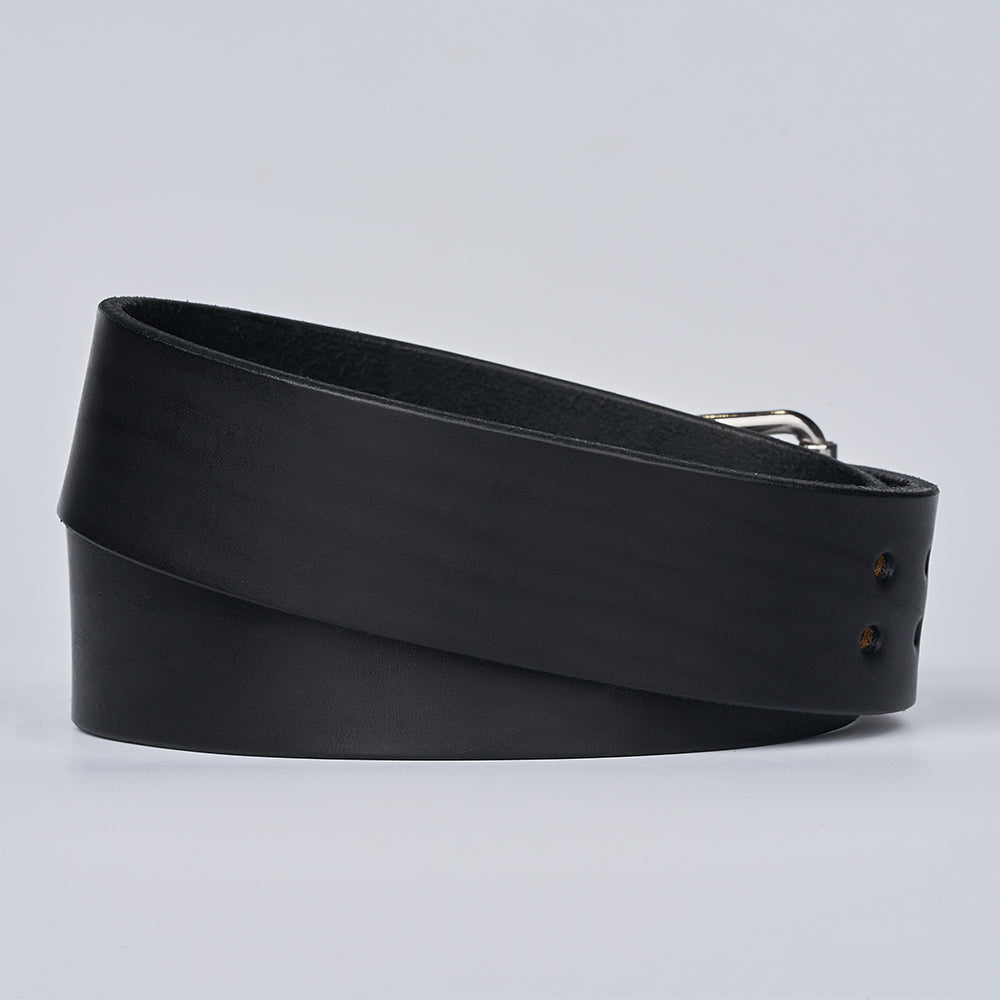 The Marshall gun belt by Hanks Belts, a 2" wide coiled black leather concealed carry belt with a silver buckle and two visible holes near the end, is displayed against a plain light grey background.