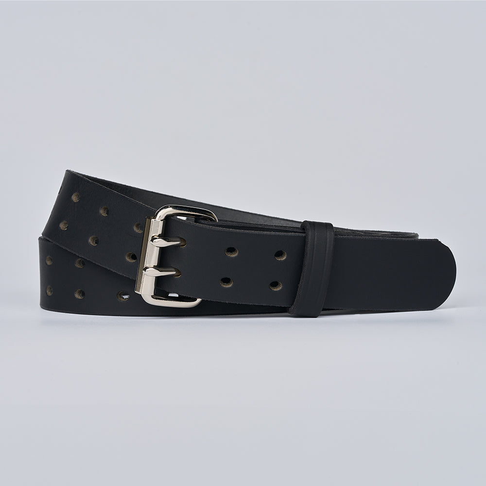 The Hanks Belts Woodstock Double Prong Retro Style, a black full grain leather belt with multiple holes and a silver buckle, is neatly rolled on a plain light gray background.