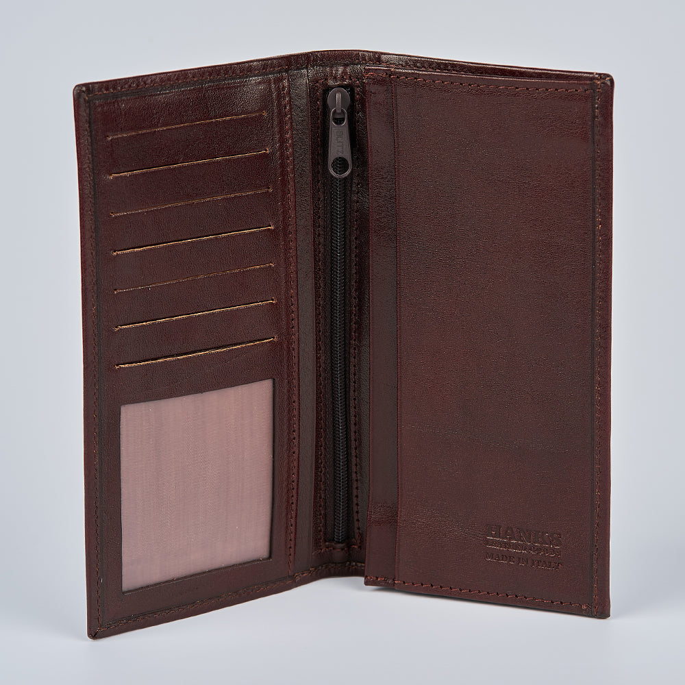 The Hanks Belts Vico Italian Breast Pocket Bifold is a slim, open wallet in leather with multiple card slots, a transparent ID slot, zippered pocket, and inner embossed branding. Shown against a plain light grey background.