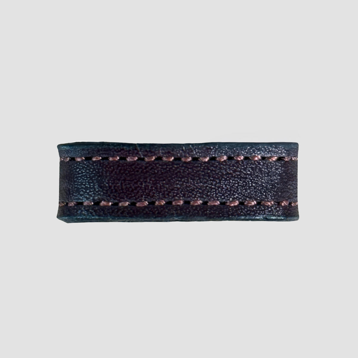 A close-up of the Hanks Belts 1" Stitched #10 Keeper, featuring dark brown vegetable tanned leather with visible stitching along the edges, set against a plain light gray background.