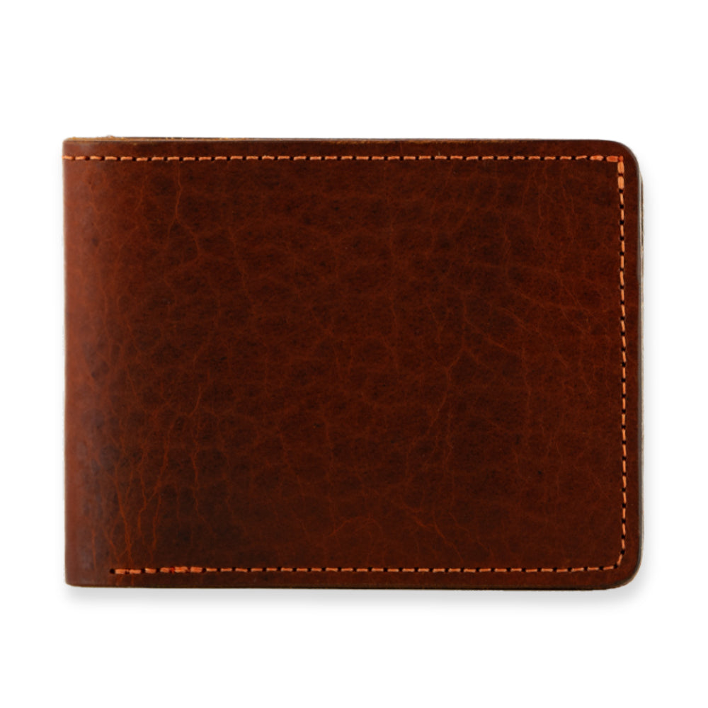 The Lanier Premium Bison Bifold by Hanks Belts is a closed brown bison leather wallet with visible edge stitching, shown on a white background—a durable wallet built to last.