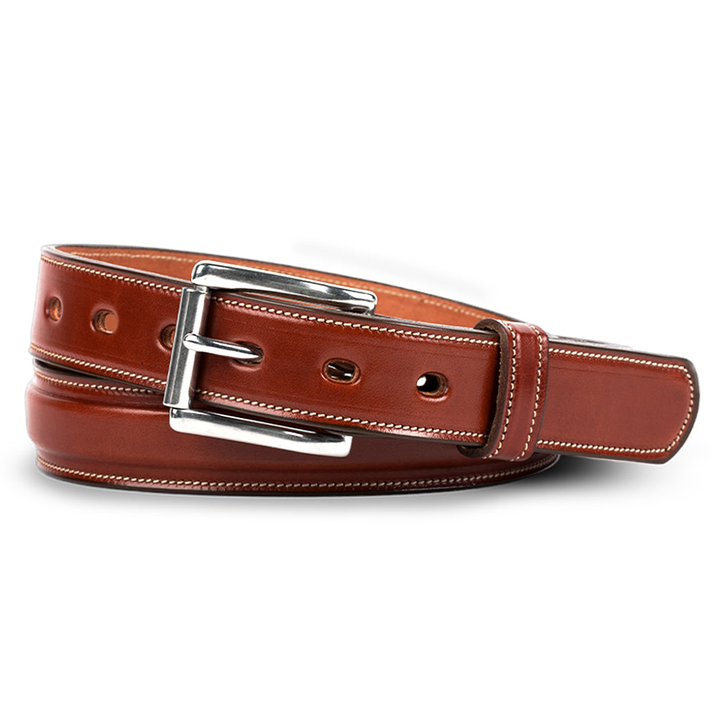 The Esquire Raised belt by Hanks Belts in oak, crafted from English Bridle leather with white stitching and a silver buckle, features multiple holes and is shown coiled on a white background.