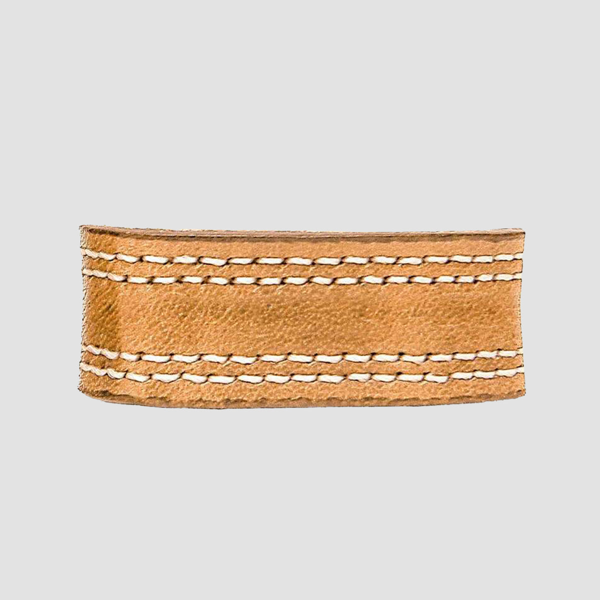 The Hanks Belts 1.5" Double Stitched #3 Keeper is USA-made from light brown leather with white edge and center stitching, shown on a gray background—ideal for pairing with a premium double leather belt.