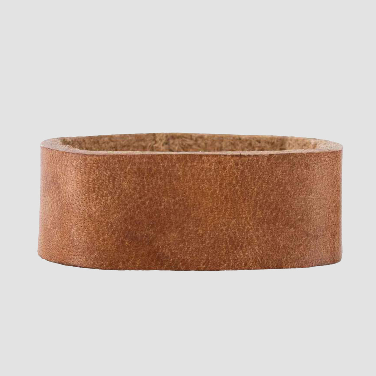 The Hanks Belts 1.5" Double Stitched #4 Keeper is a wide brown leather cuff bracelet, crafted from smooth Old World Harness Leather and displayed on a plain light gray background.