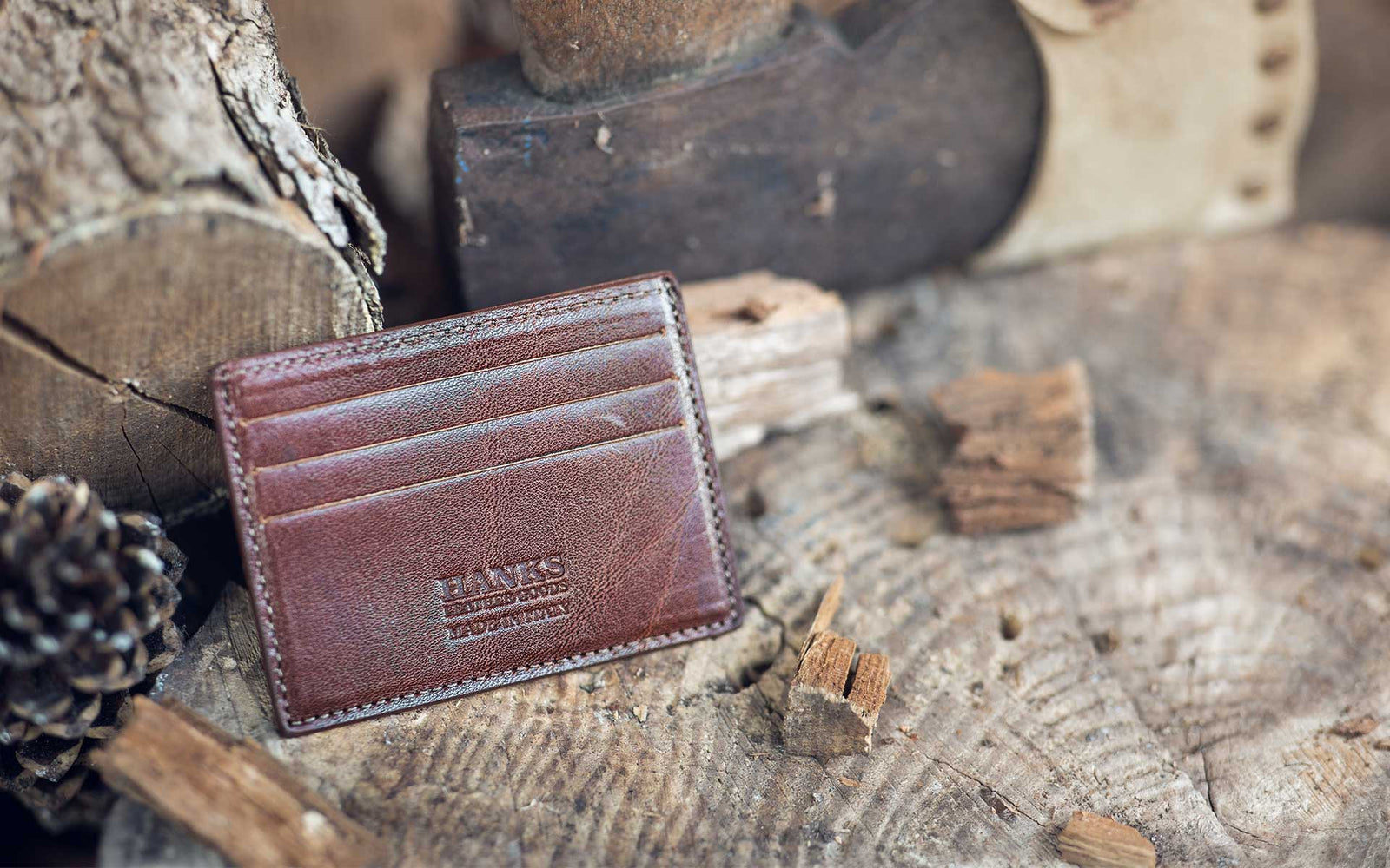 Hanks Leather Goods Italian Wallet Sitting On Wood