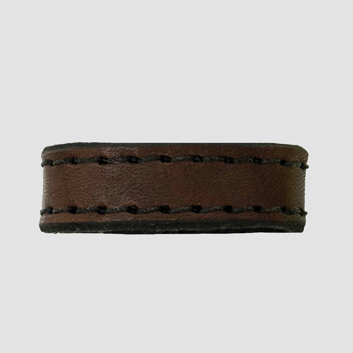 A close-up of the Hanks Belts 1.25" Stitched #2 Keeper, crafted from brown full-grain steer hide with visible black stitching along the edges, shown on a plain light gray background.