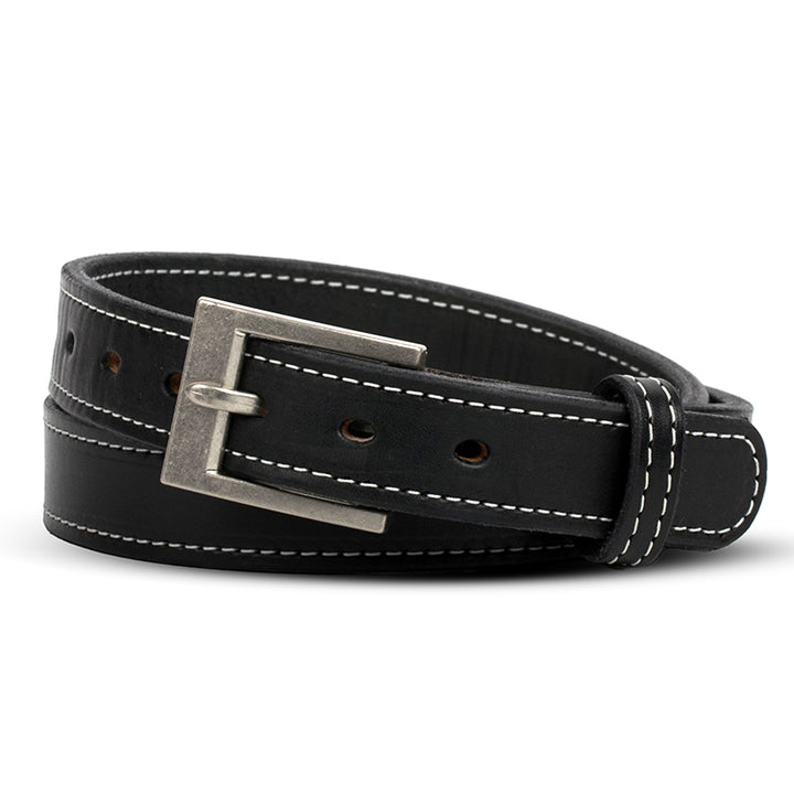 The Bonnie by Hanks Belts in Black with White Stitching, made from full-grain vegetable tanned leather and finished with a silver rectangular buckle, is shown coiled neatly on a white background.