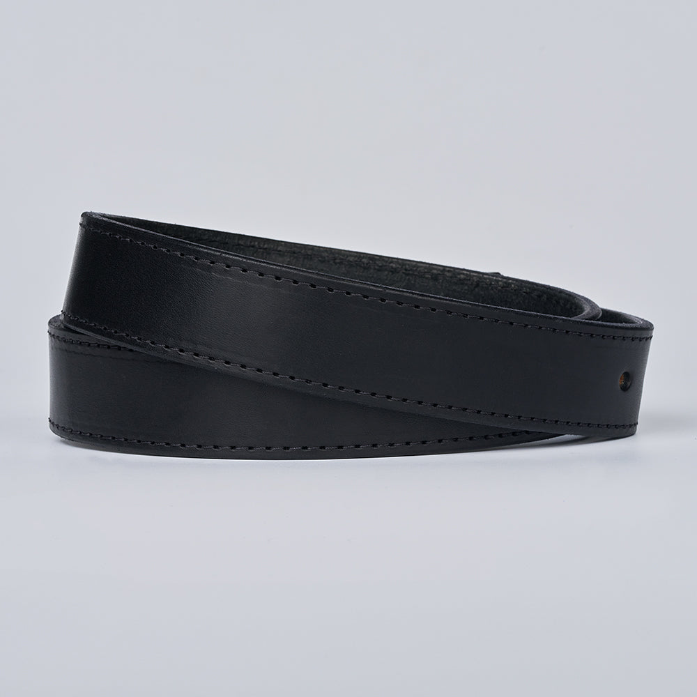 The Black Out Tactical by Hanks Belts is a coiled black extreme leather belt with visible edge stitching, displayed against a plain light background.