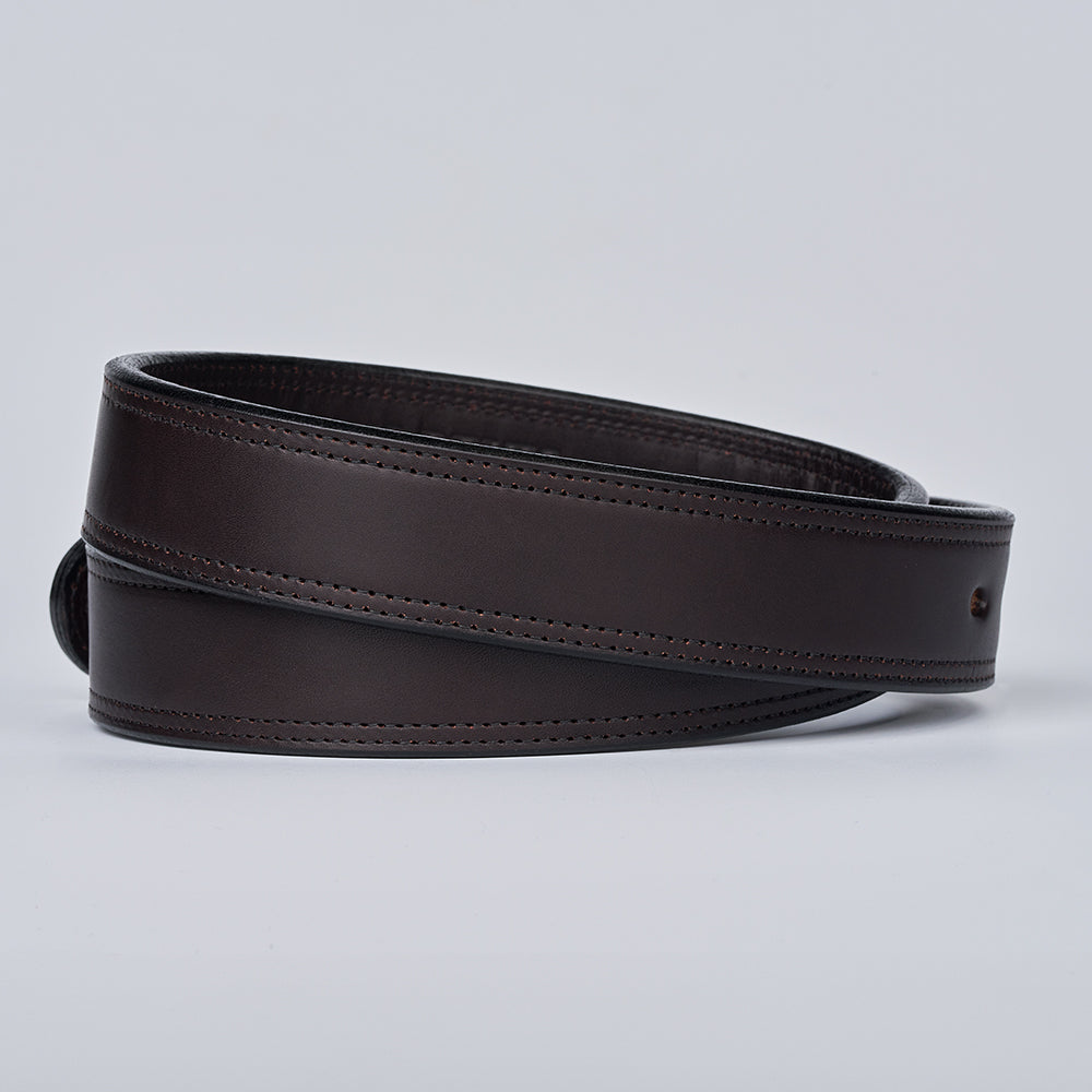 The Brute Double Layer belt by Hanks Belts, made from vegetable-tanned dark brown leather with visible stitching, is shown coiled on a plain light gray background.