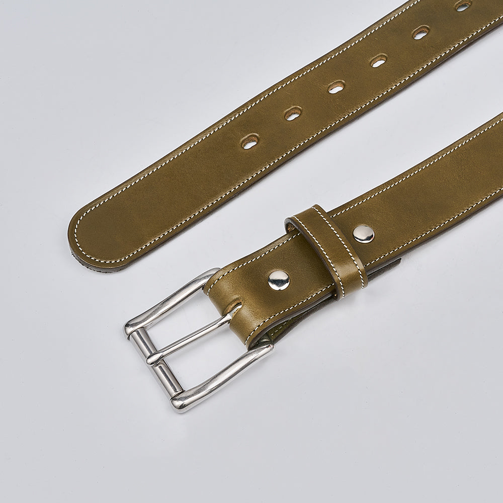 The Canyon by Hanks Belts: an olive green English bridle leather belt with white stitching, silver buckle, and multiple adjustment holes, shown on a light gray background.
