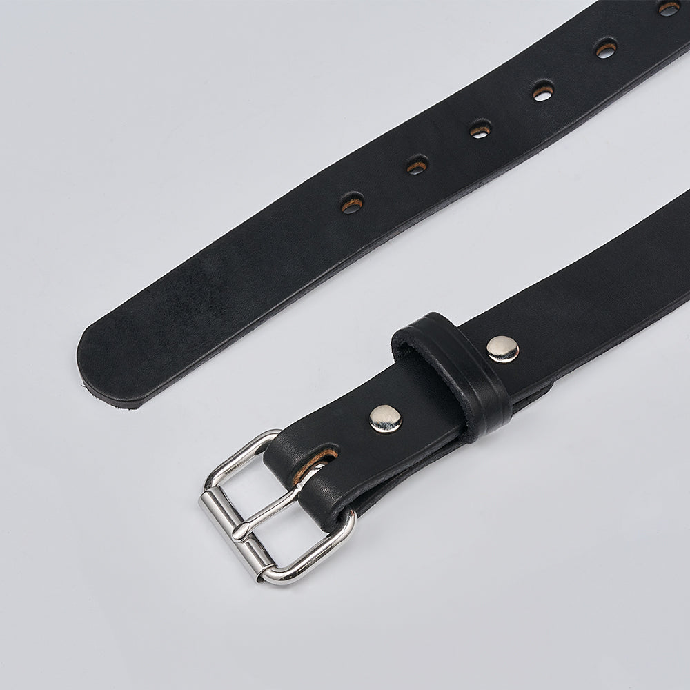 The Deputy by Hanks Belts, a black leather gun belt with a silver buckle and multiple adjustment holes, is displayed flat on a light gray surface.