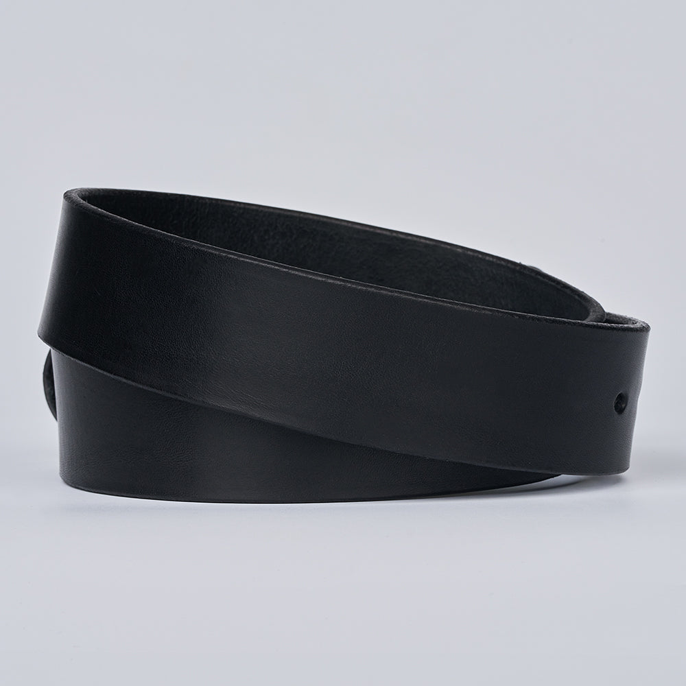 The Enforcer by Hanks Belts is a coiled black leather gun belt with a smooth finish and a single visible hole, shown on a plain light gray background.
