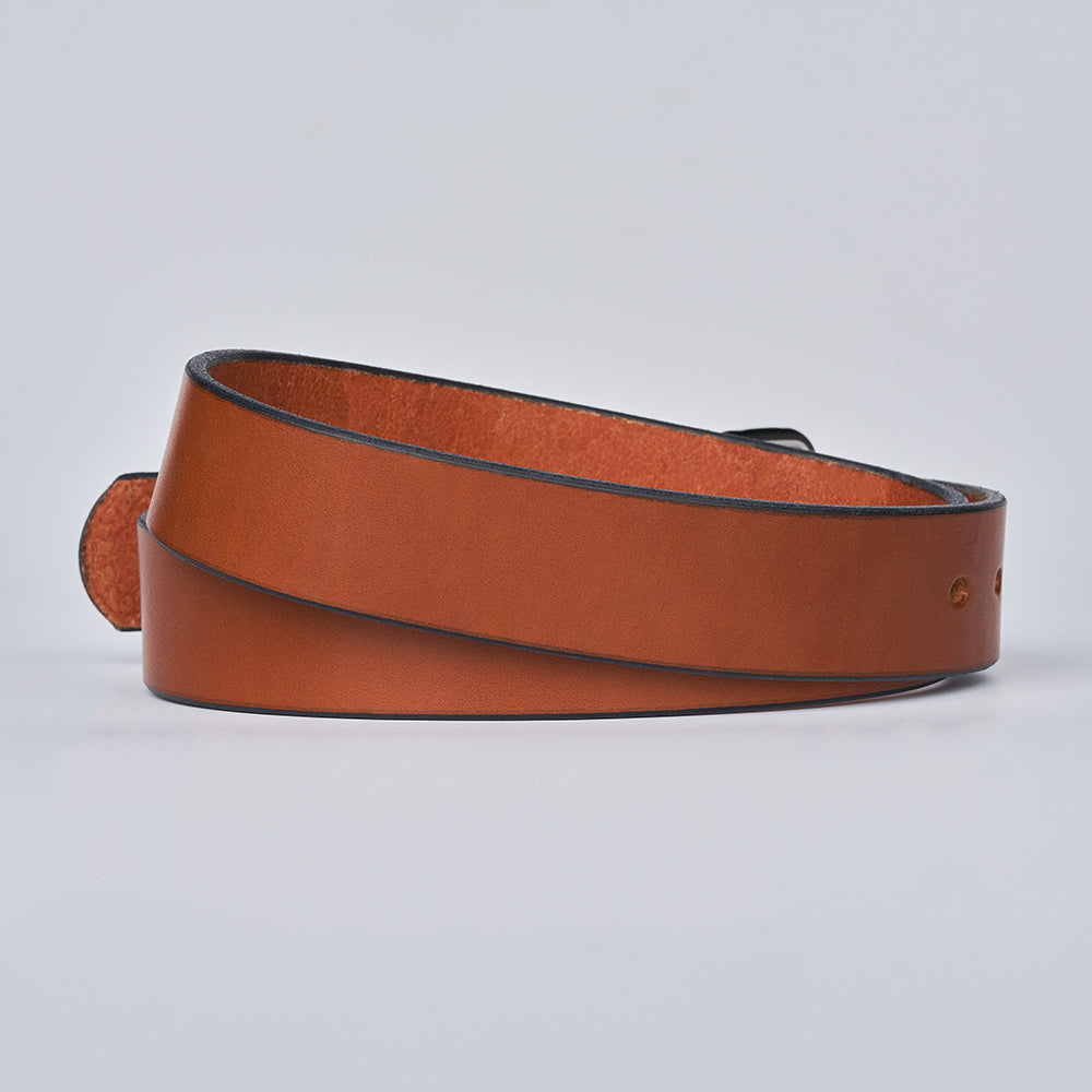 The Gunner by Hanks Belts is a coiled brown leather belt with black edges and a smooth finish, displayed on a plain light background.
