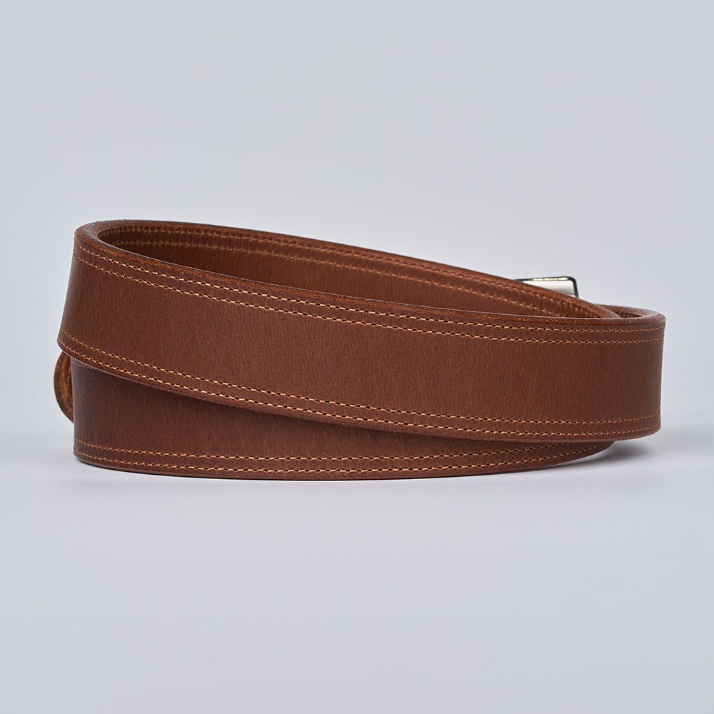 Brown leather belt on a light gray background