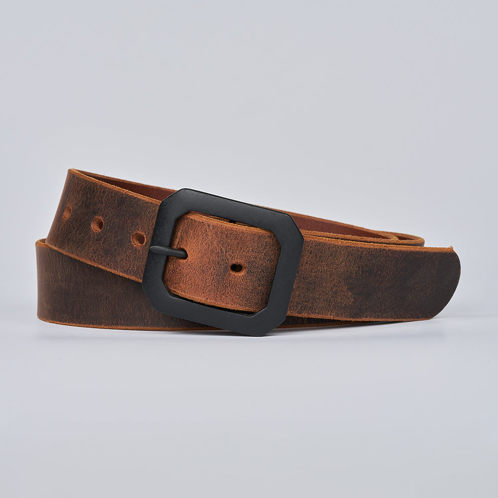 The Relic Retro Style by Hanks Belts features a Water Buffalo leather belt with a matte black buckle, coiled loosely on a plain light gray background.