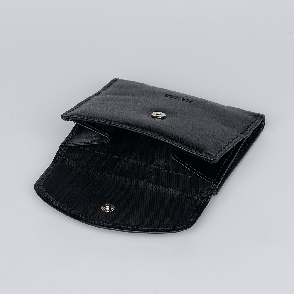 The Hanks Belts Adelina Mini Bifold wallet, made of black leather with a flap lid and snap button closure, is displayed open and empty on a plain light background.