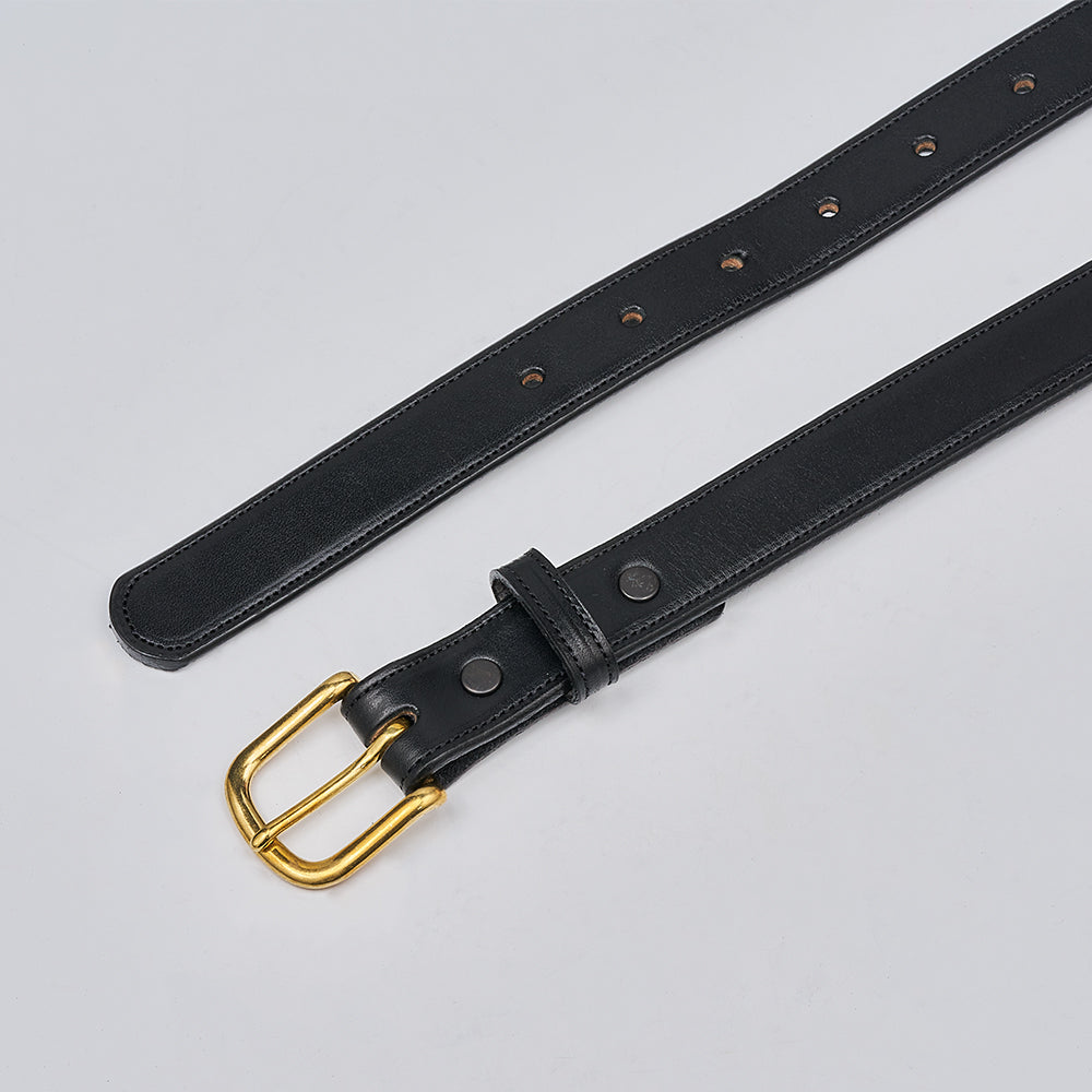 The Addyson - 1&quot; by Hanks Belts is a classic leather belt crafted from English Bridle Full-Grain Leather with a brass buckle. It’s laid flat on a light gray surface, featuring multiple adjustment holes and simple edge stitching.
