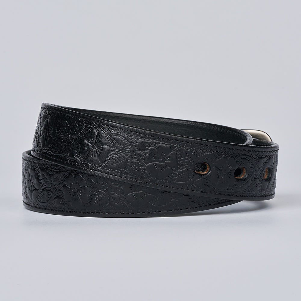 The Floral Embossed by Hanks Belts is a coiled black women&#39;s leather belt with a silver buckle and embossed floral pattern, displayed on a plain light background.