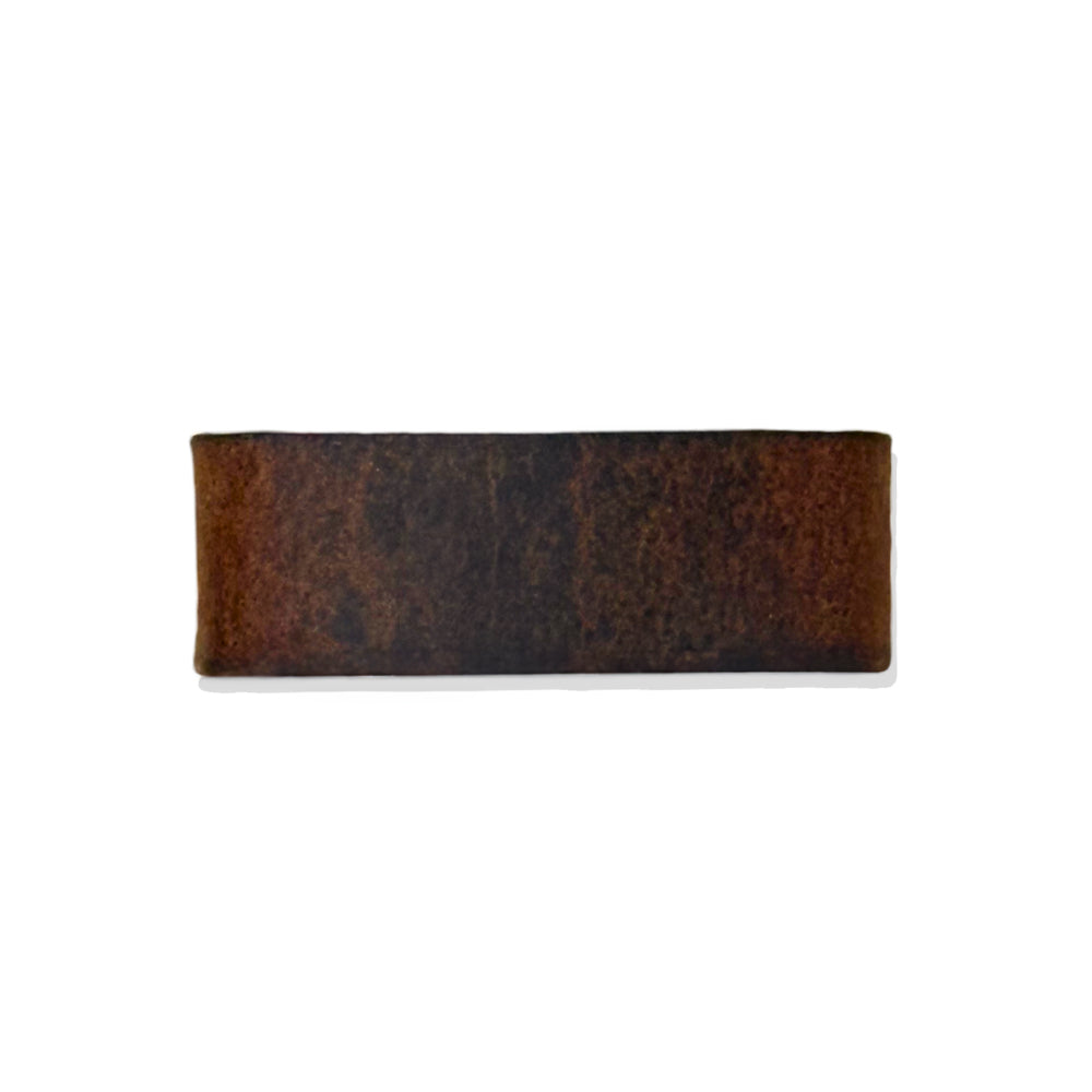 The 1.25&quot; Bison #21 Keeper by Hanks Belts, a rectangular dark brown leather piece with subtly rounded edges, is displayed against a white background.