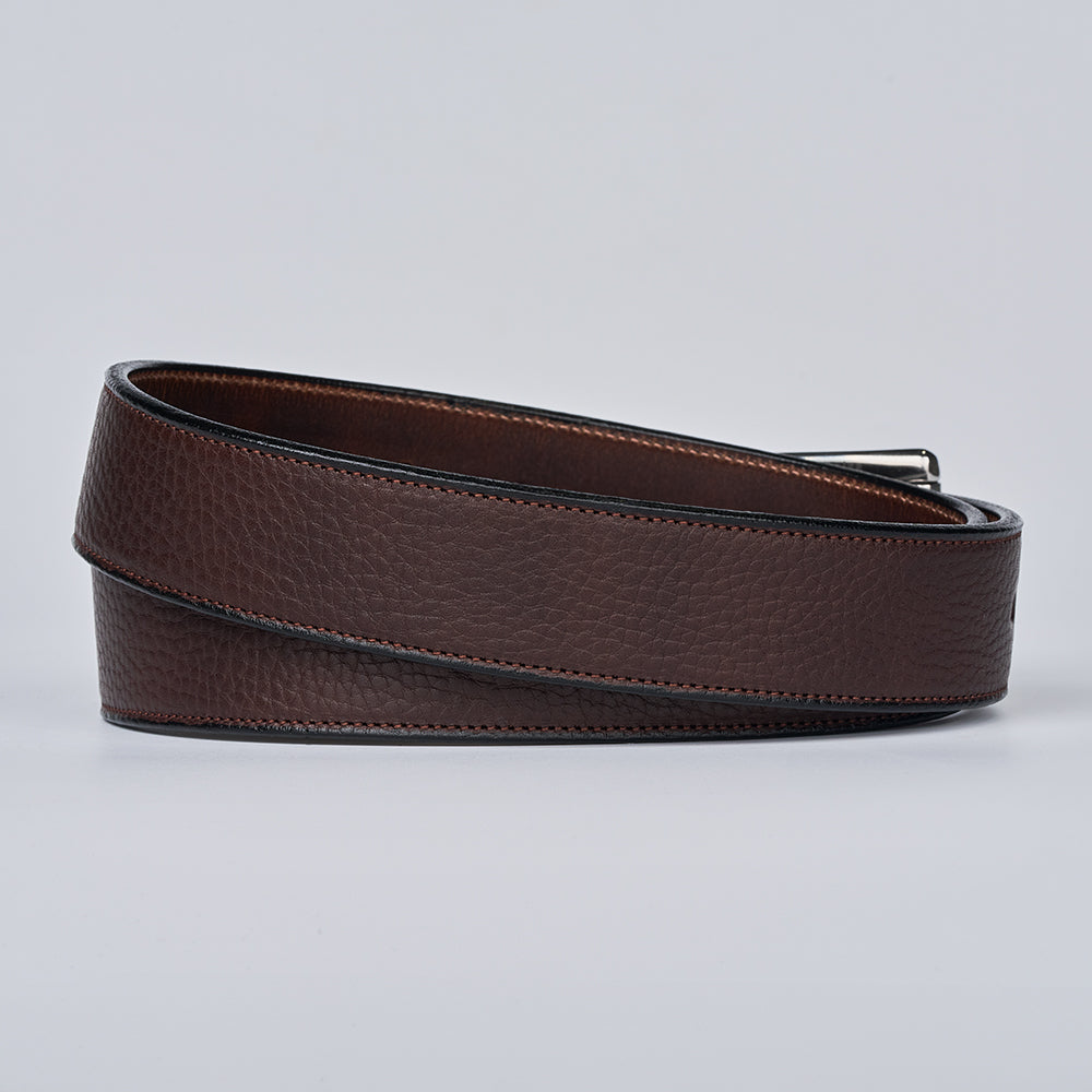 Brown leather belt on a light gray background