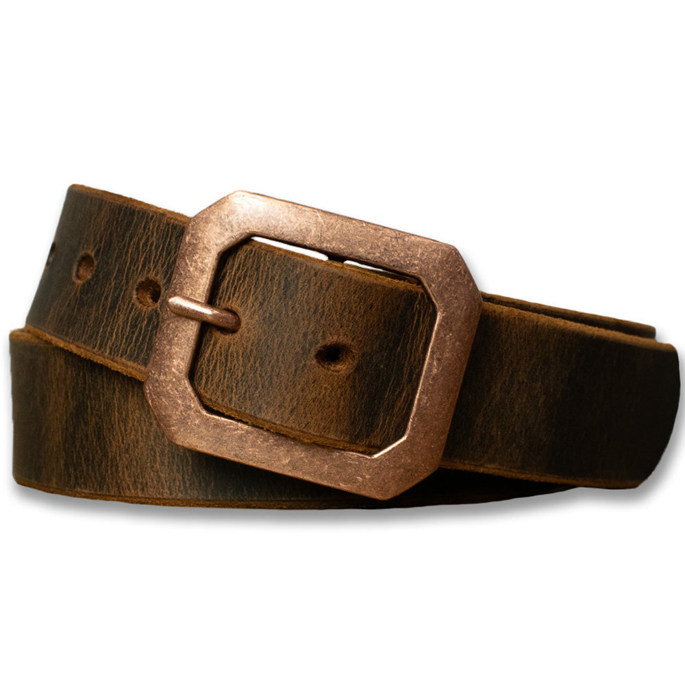The Relic Belt - 1.5" from Hanks Belts, crafted from premium Australian Water Buffalo leather, showcases a distressed brown finish for a rugged look. Coiled in a loop, it features a large octagonal buckle with an antique copper finish.