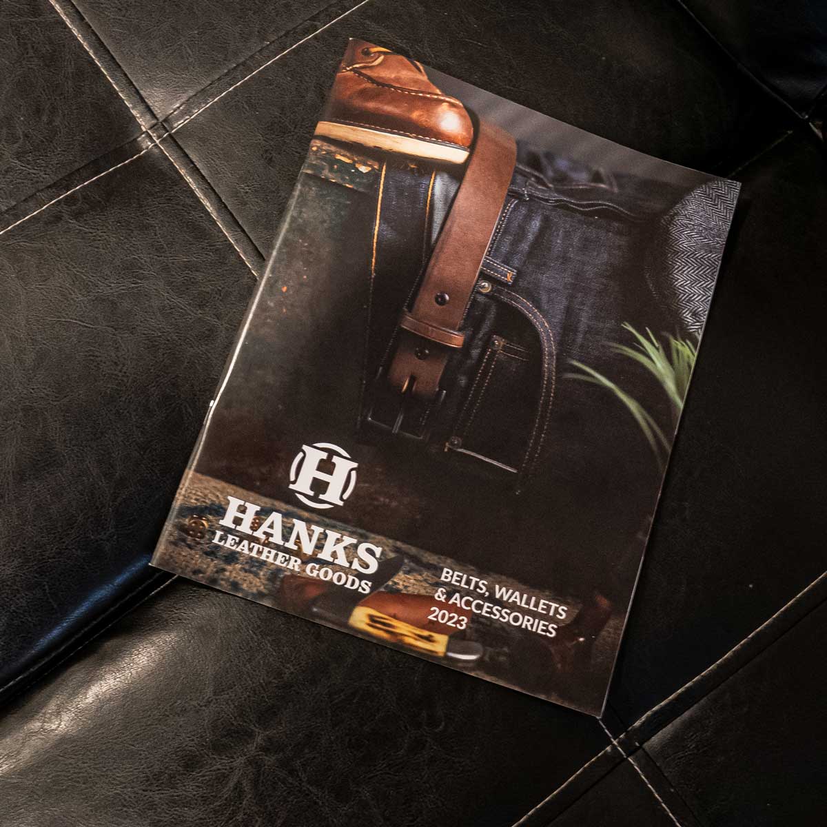 Hanks Paper Catalog Laying on couch