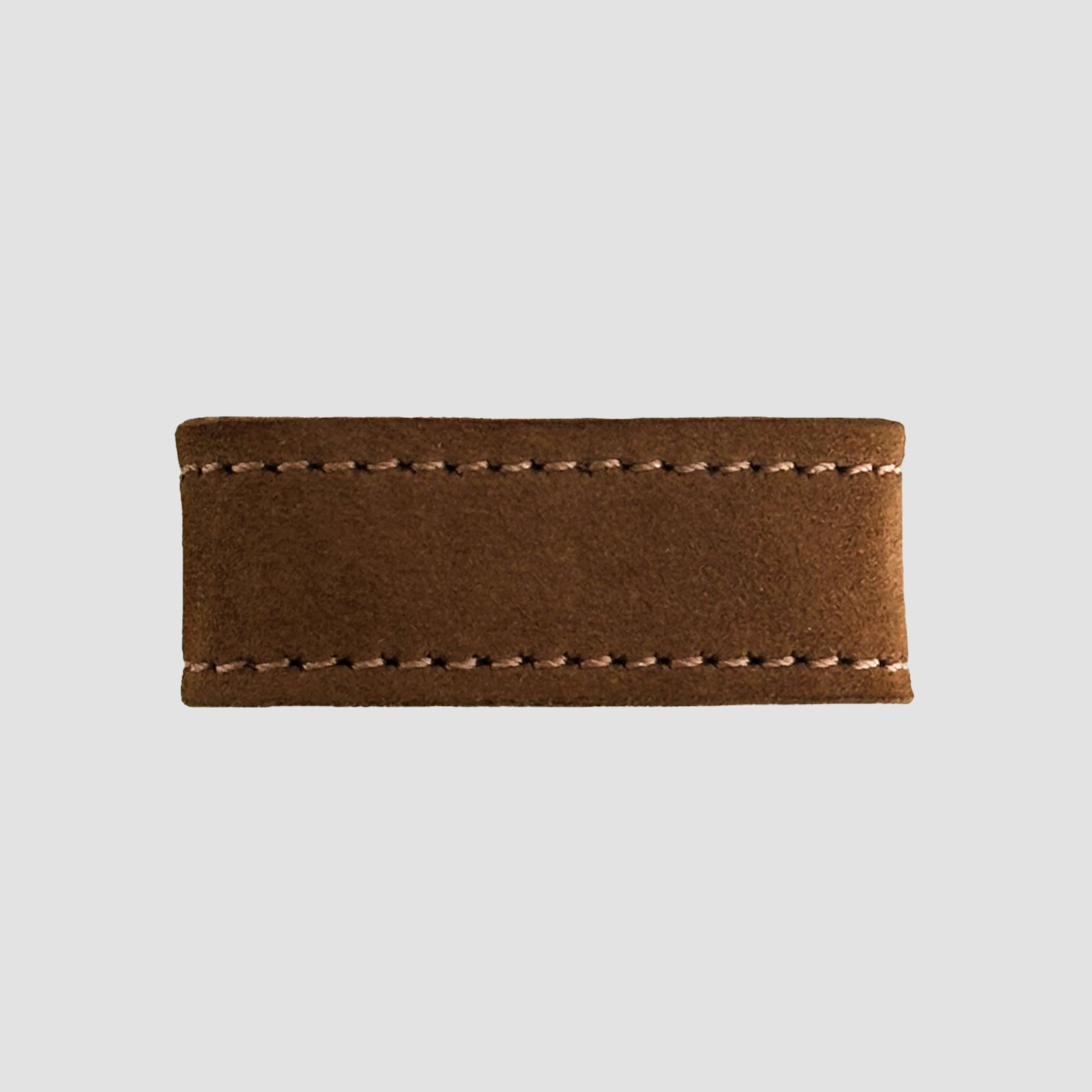 The Hanks Belts 1.5" Suede #16 Keeper is a rectangular brown suede leather belt keeper with visible stitching on the top and bottom edges, displayed on a plain light gray background.