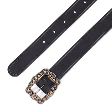 The Hanks Belts Lennon Suede Belt - 1" is crafted from soft nubuck leather and features a decorative buckle with amber-colored stones and silver accents. It includes multiple holes for adjustable sizing, providing a personalized fit.