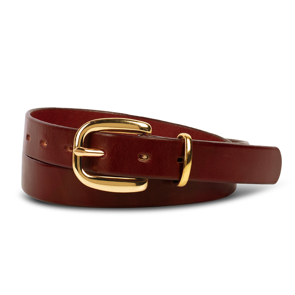 The Poppy - 1&quot; by Hanks Belts is a burgundy leather belt with a gold buckle, coiled neatly on a white background—a classic accessory that brings timeless style to any outfit.