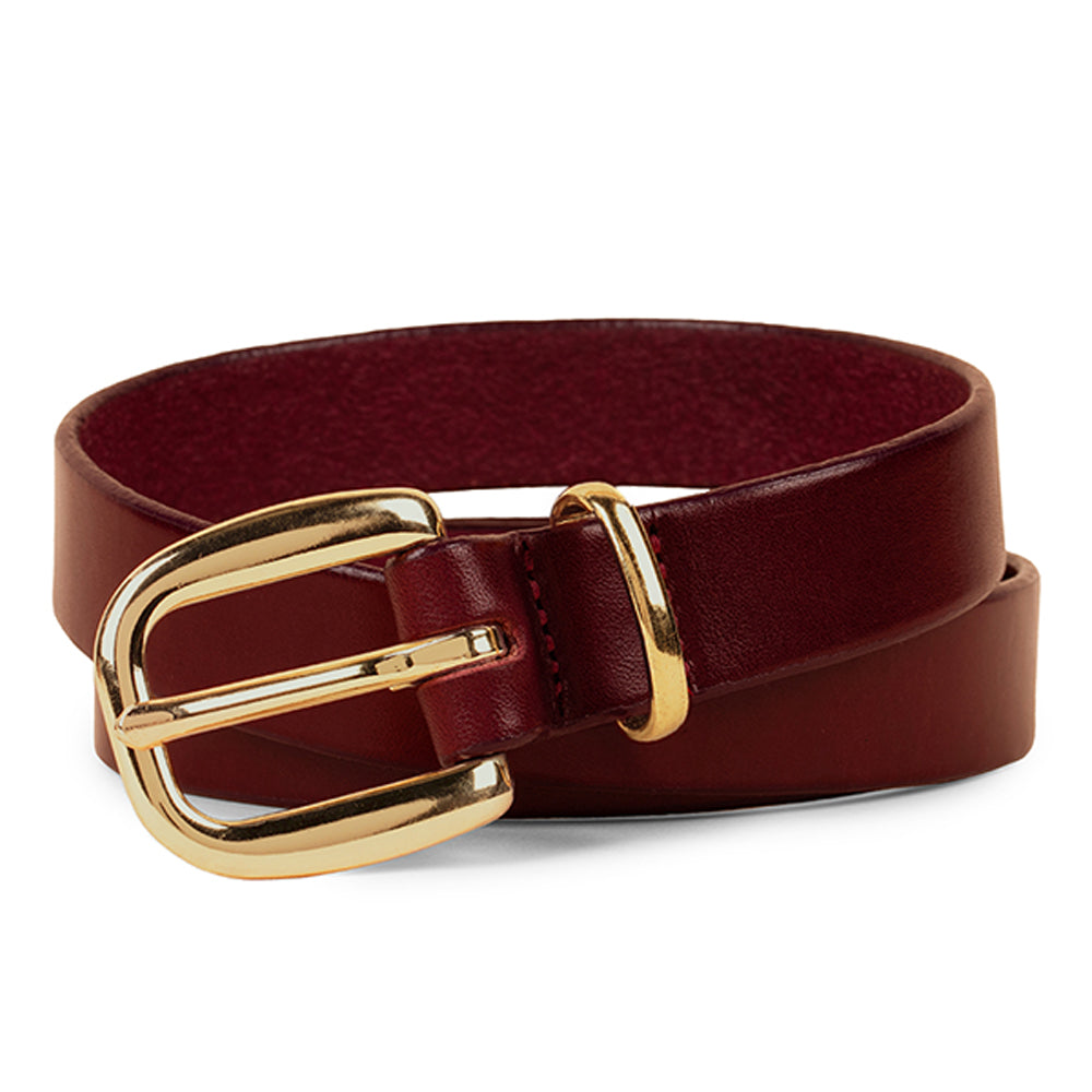 The Poppy - 1&quot; by Hanks Belts is a dark red premium leather belt with a shiny gold rectangular buckle and matching loop, displayed coiled on a white background—a versatile accessory for any wardrobe.