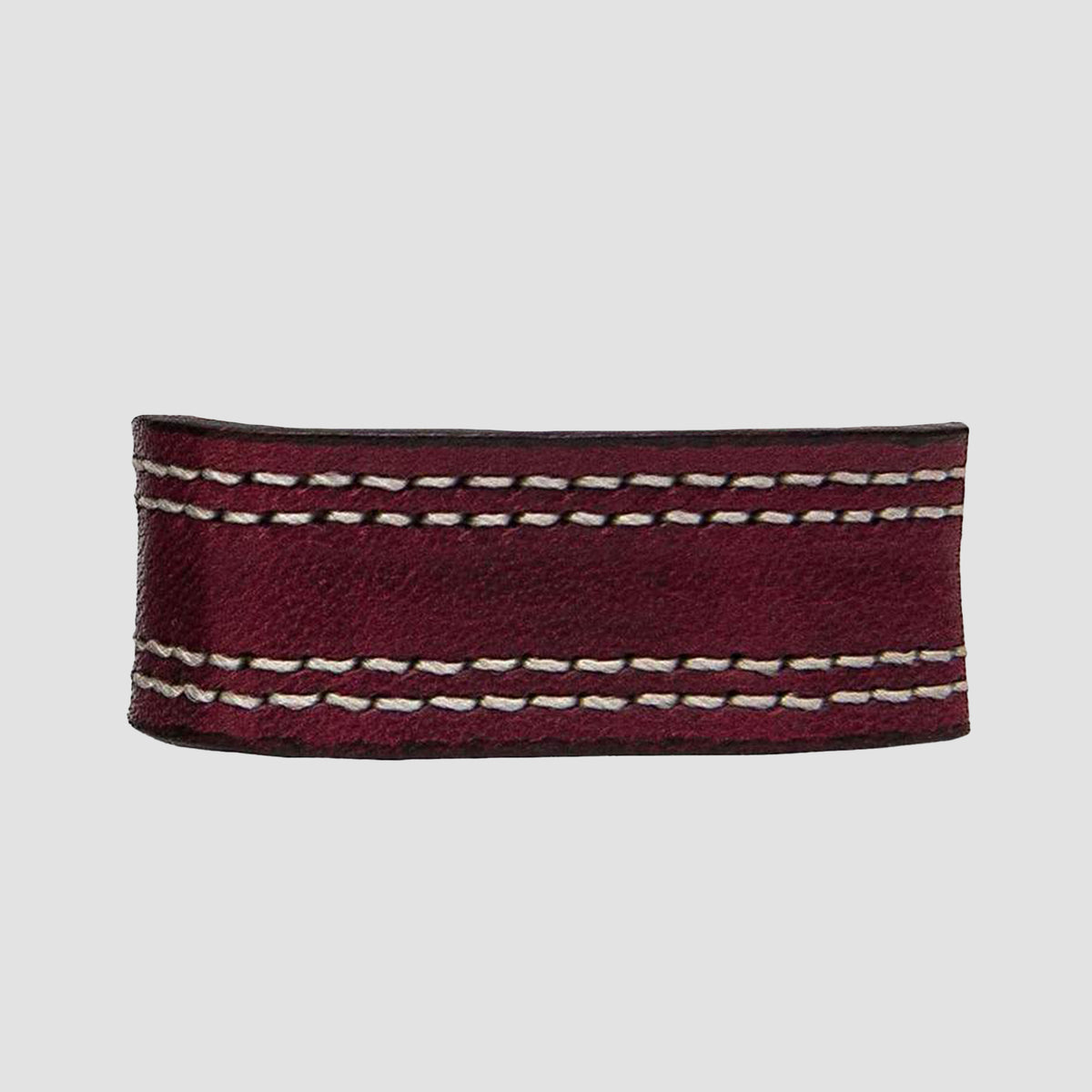 A close-up of the Hanks Belts 1.5" Double Stitched #3 Keeper in dark red leather with white top and bottom stitching, displayed against a plain light gray background.