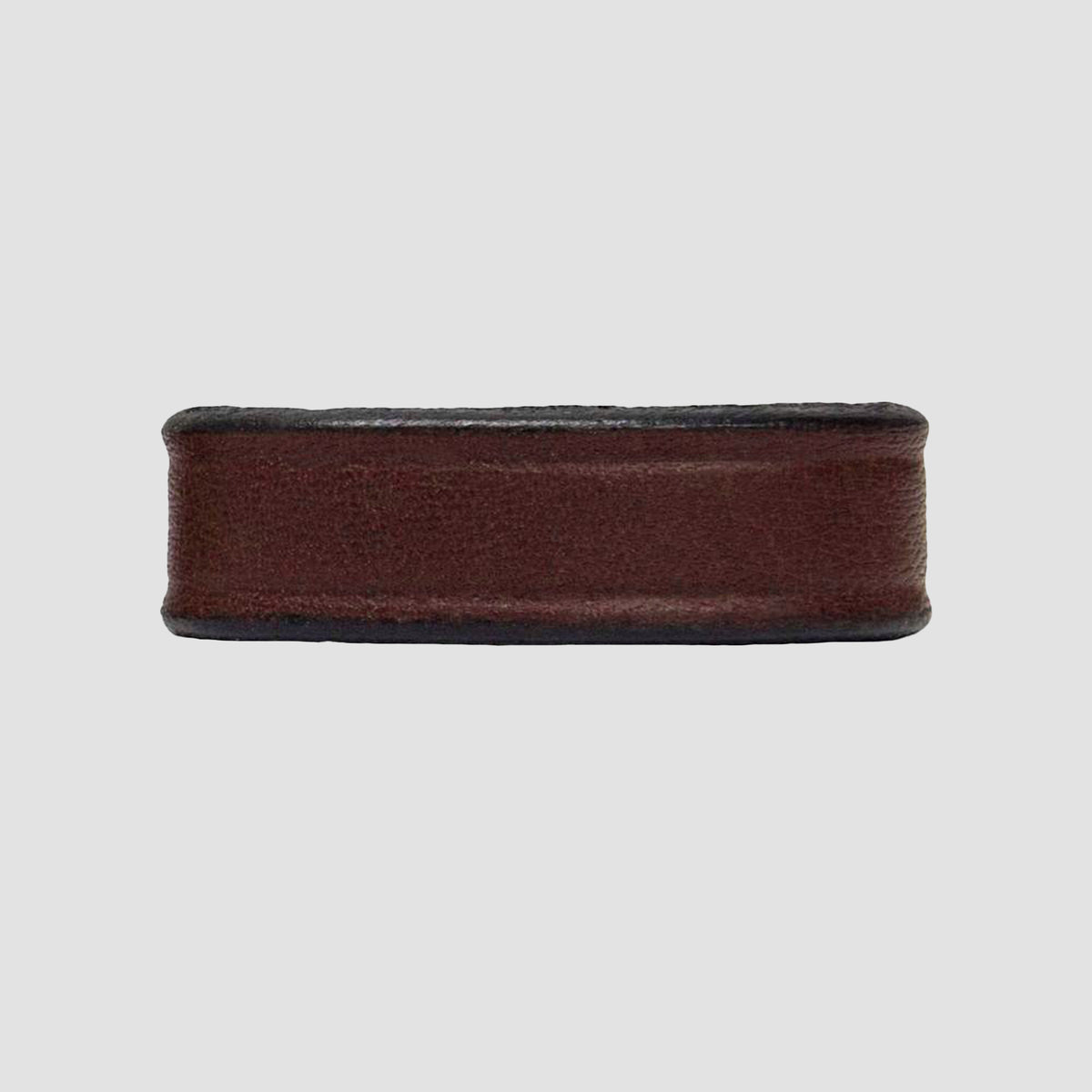 The Hanks Belts 1.5" Smooth #1 Keeper in brown, perfect for use as a belt keeper on 1.5" wide belts, is shown against a plain light grey background.