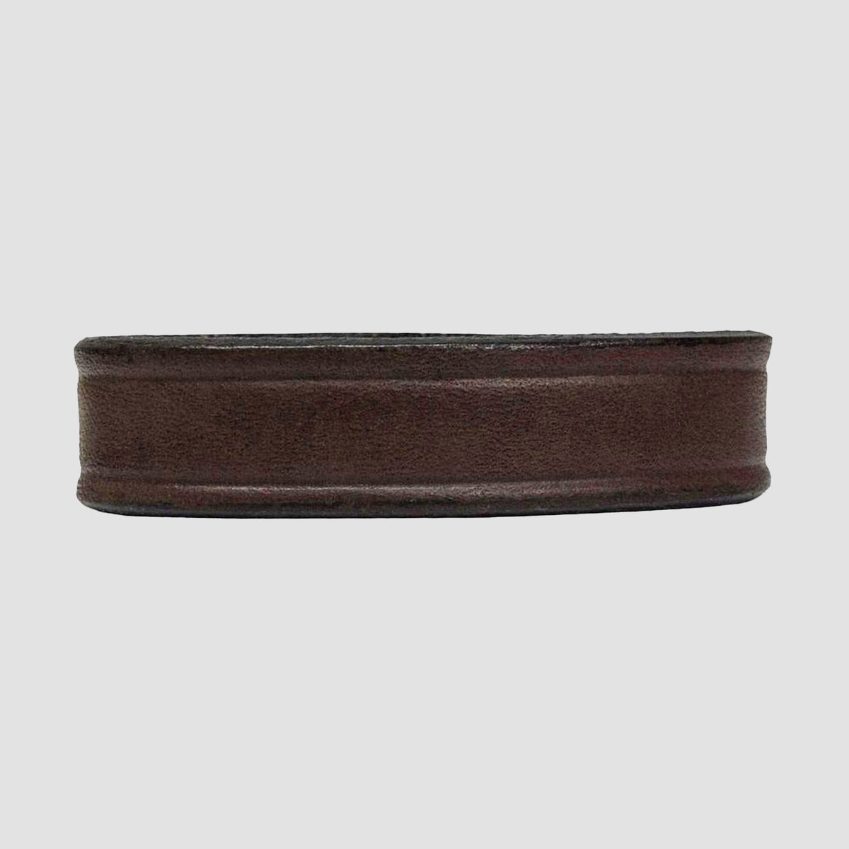 The Hanks Belts 1.75" Smooth #1 Keeper is a brown vegetable tanned leather wristband or belt keeper with smooth edges, displayed on a plain white background.