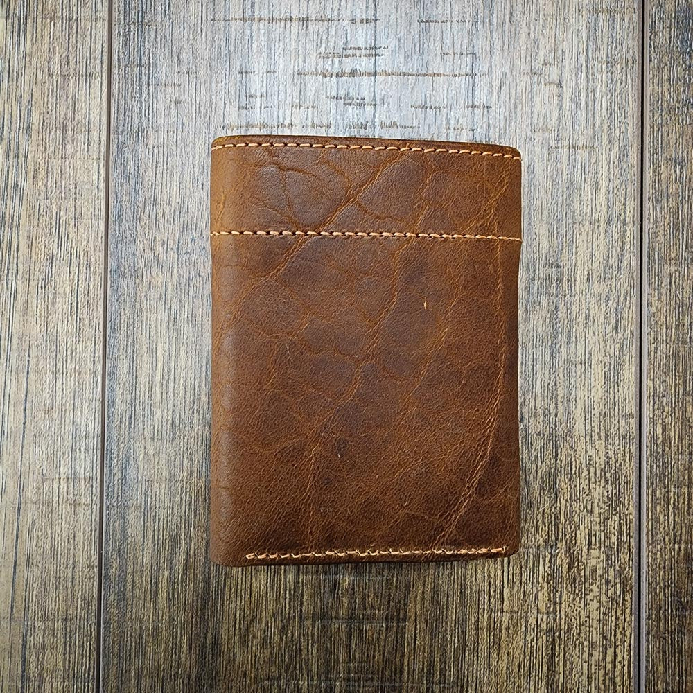 Hanks USA Made Bison trifold on Wooden background